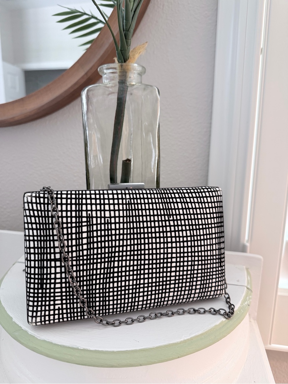 Sondra Robert’s Black & White Grid Pattern Clutch Bag with Chain Strap